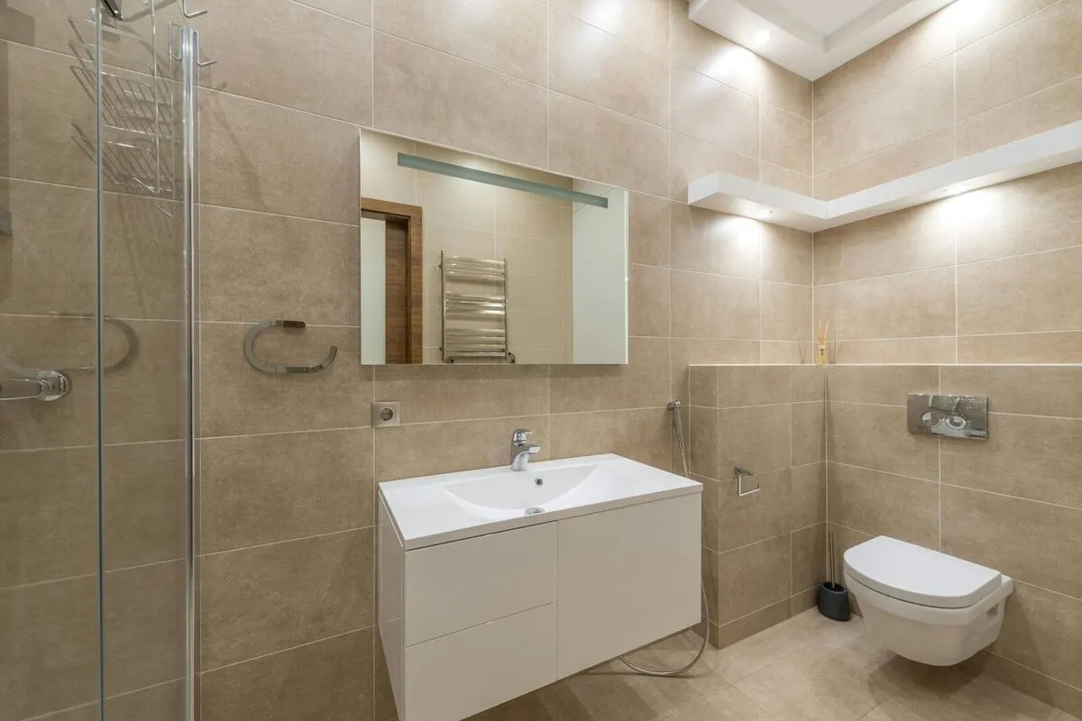 Modern bathroom renovation with freestanding tub